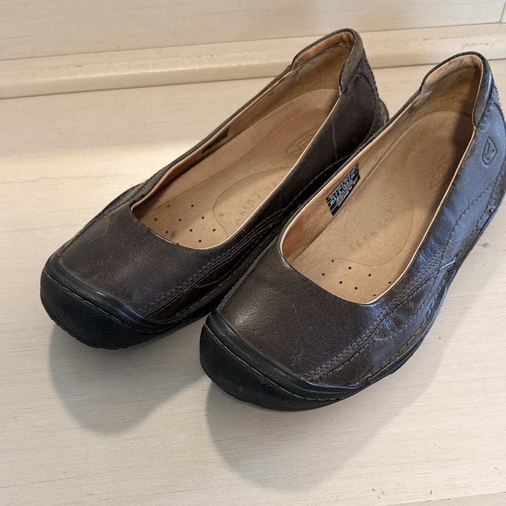 Available till April12. Keen Women's Dark Brown Slip-On Leather Flats